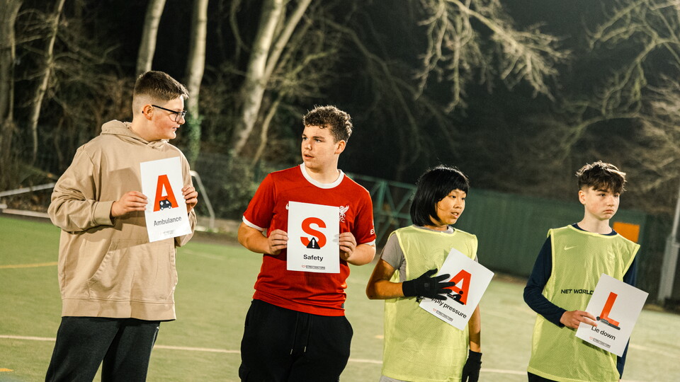 Kids take part in a knife crime session with Cambridge United Foundation