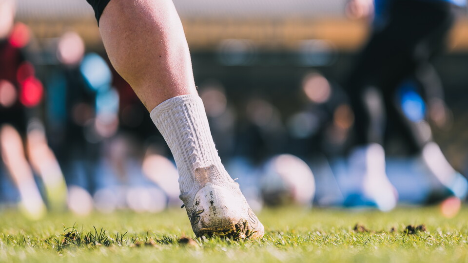 A close up of a players legs