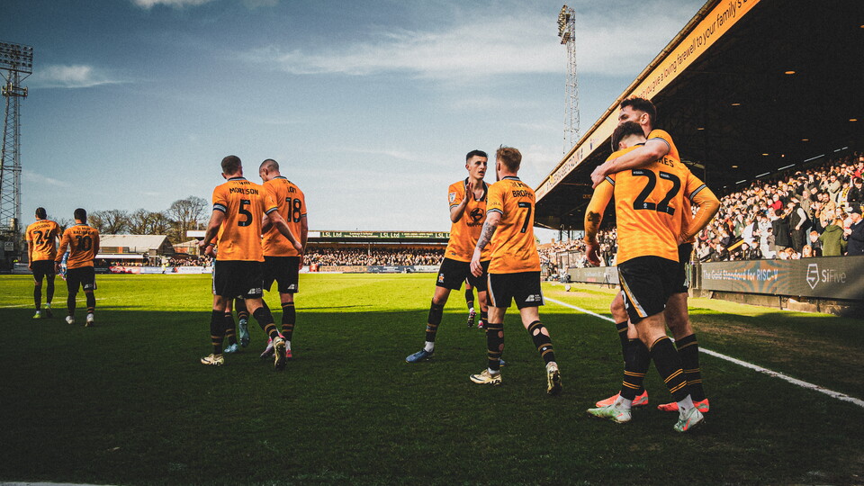 Players celebrate at the Cledara Abbey Stadium