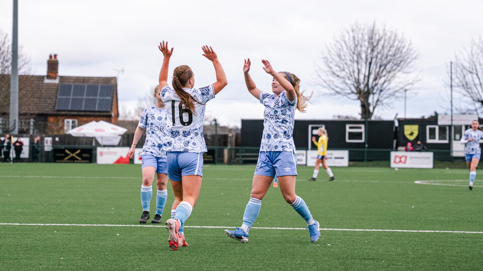 Cambridge United Women players celebrate