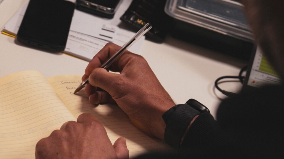 A close up of a Cambridge United staff member