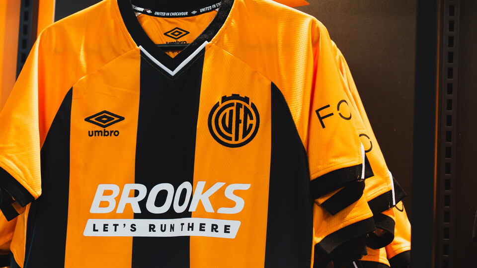 A shirt hanging up in the shop