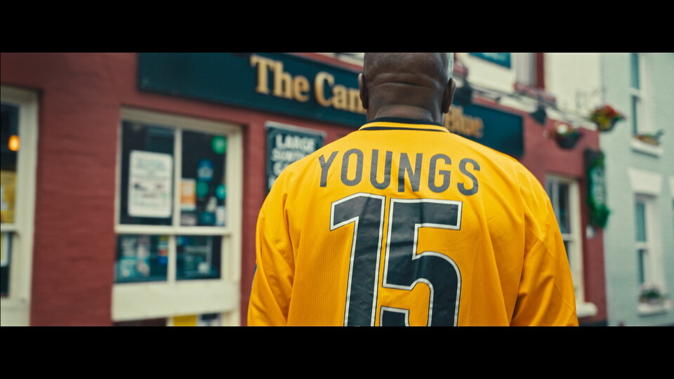 Derrick Christie wearing a Tom Young shirt