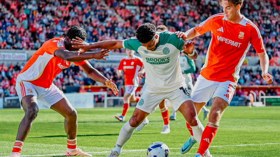 Kachunga taking on Swindon Defence