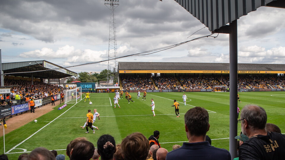 Fans watching on at the Cledara Abbey Stadium