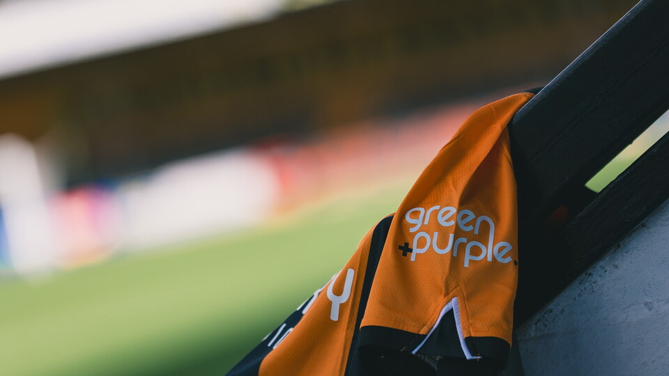 green and purple shirt sleeve 