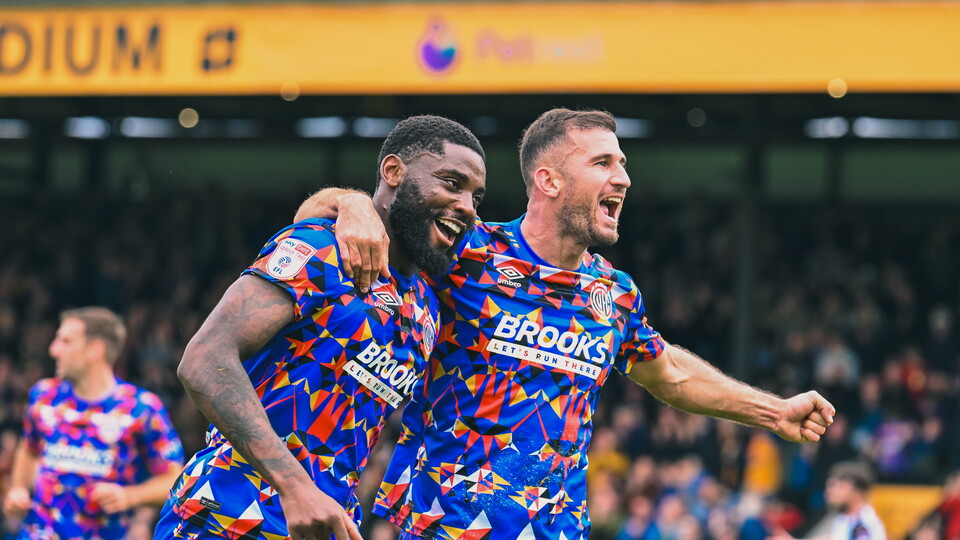 Kouassi and Ball celebrate together