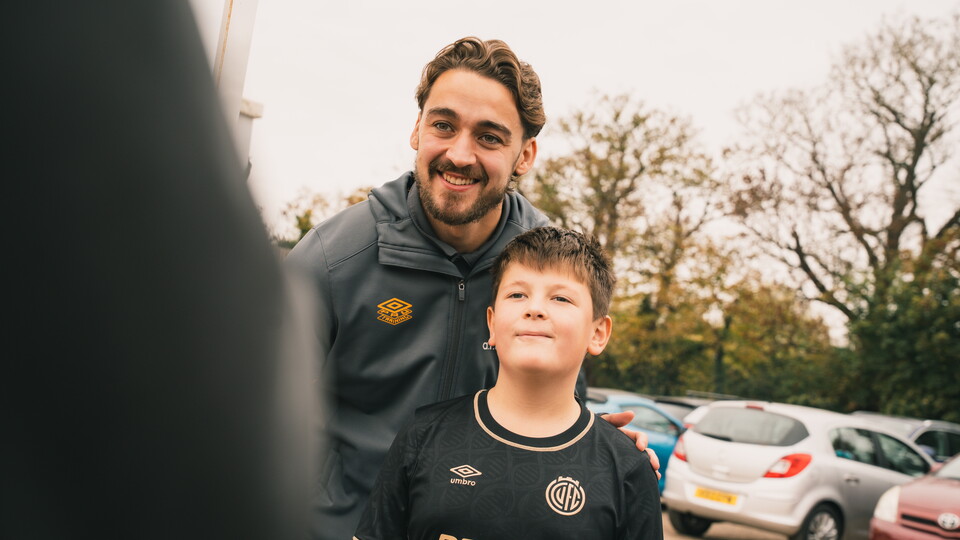 Louis Appere with a young fan