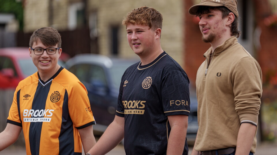 Fans walking to the Cledara Abbey Stadium