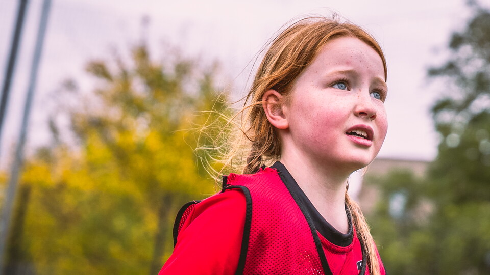 A young girl at a Soccer School