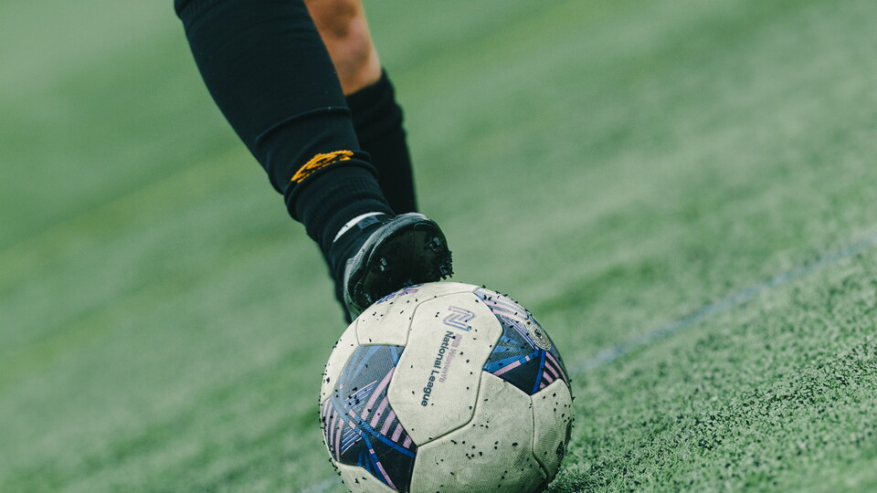 A close up of a Women's player