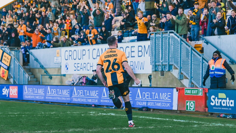 James Gibbons celebrates vs Salford City