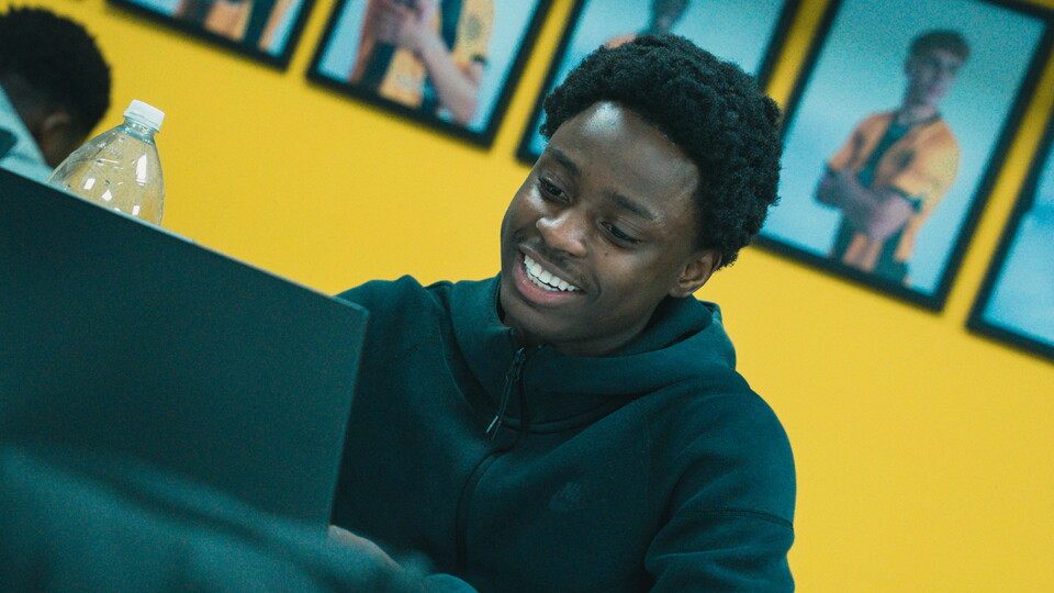 Cambridge United scholar in class