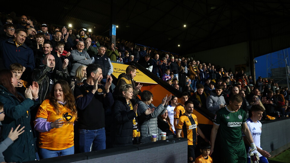 The players enter the pitch