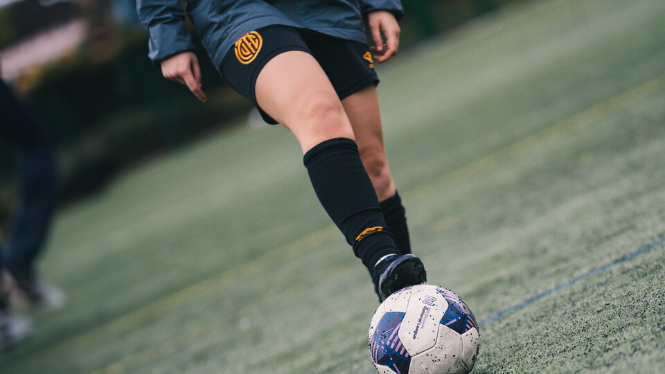 A close up of a Women's player