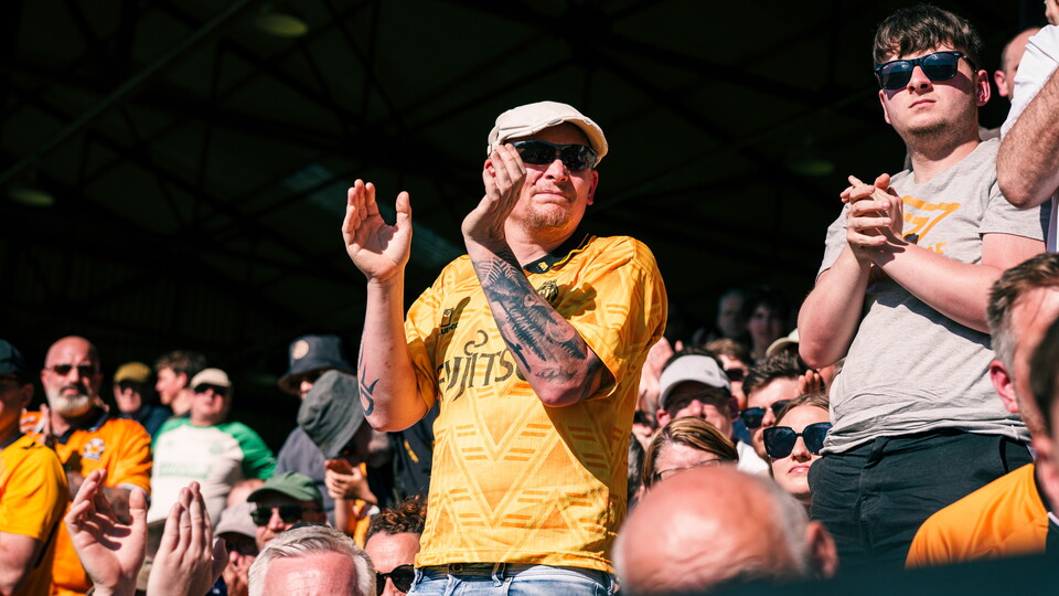 Cambridge United fan applauds