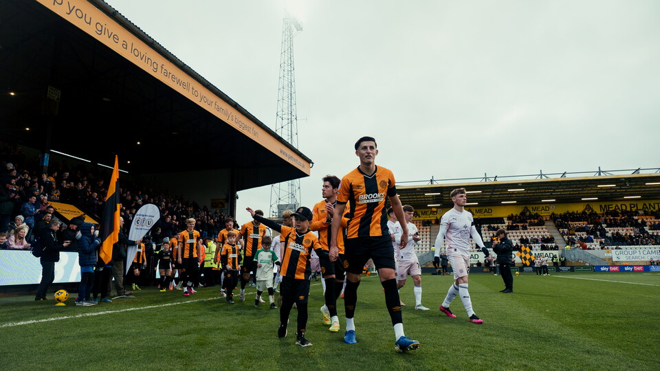A mascot with Kell Watts