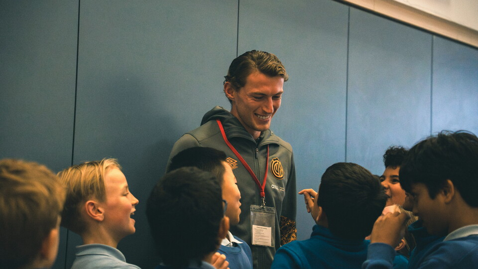 Zak Bradshaw at a school assembly