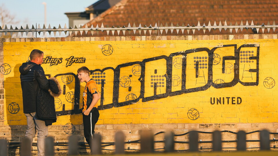A fan outside the Cledara Abbey Stadium