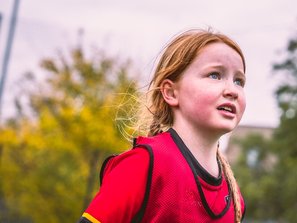A young girl at a Soccer School