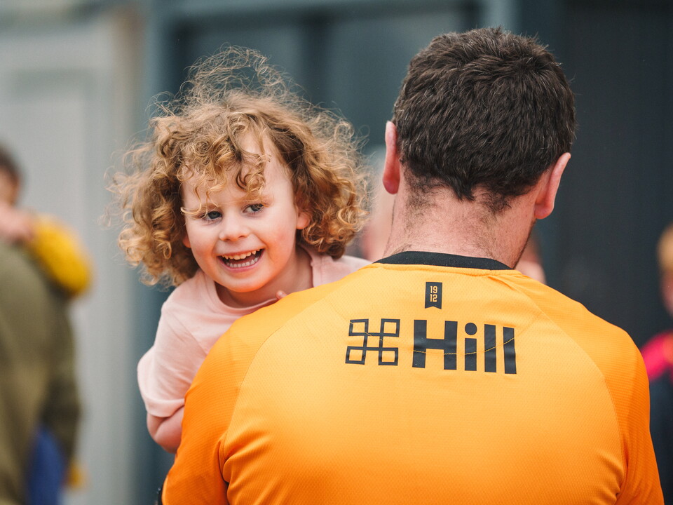 A young fan and her Dad at the Cledara Abbey Stadium