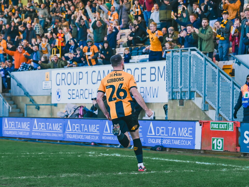 James Gibbons celebrates vs Salford City