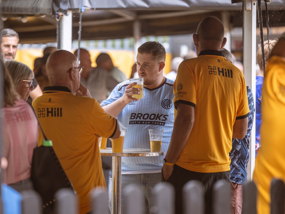 Fans at the Cledra Abbey Stadium